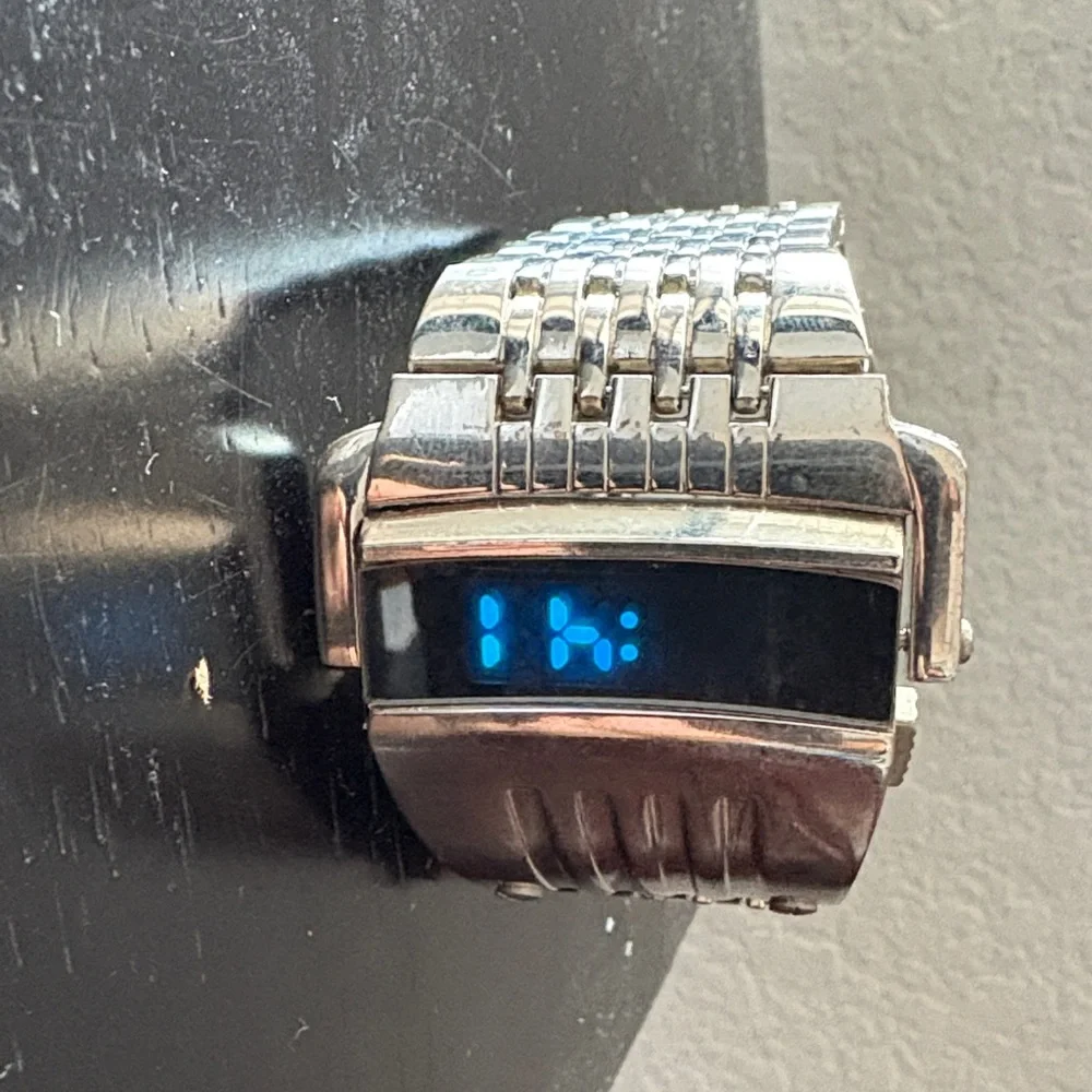Elegant Silver Smartwatch with Blue Display